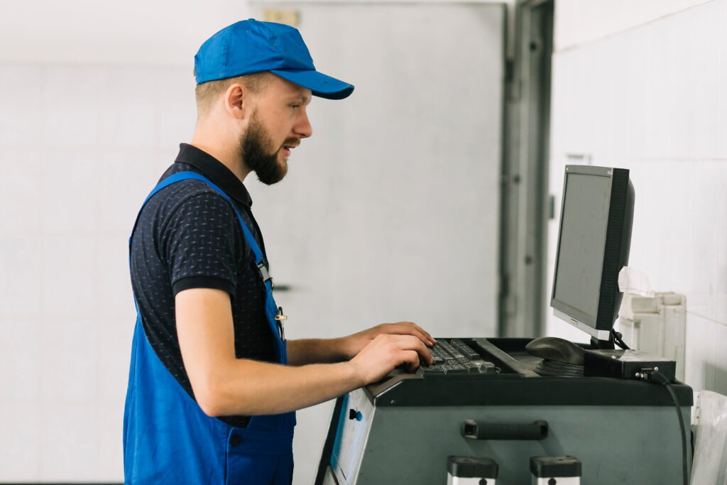 technician typing keyboard garage (1)